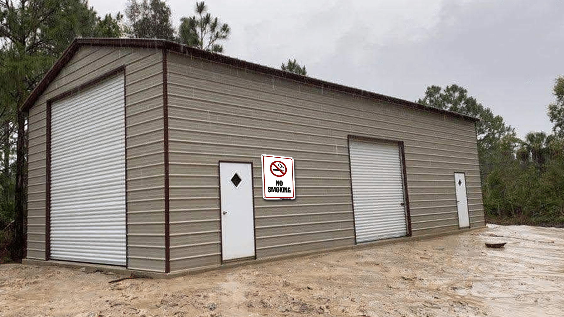 A metal building from outdoor options in Eatonton Georgia that has a no smoking sign on it