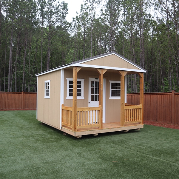 Beautifully designed cabin-style shed in a backyard setting.